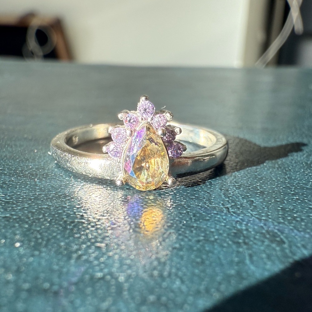 Elegant Silver Ring with Purple iridescent Gemstones